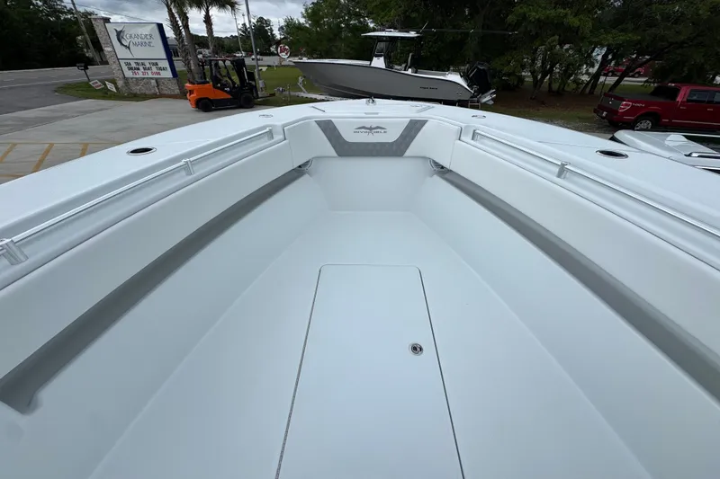 Slide: The Image of 2026 Invincible 33 Open Fisherman boat interior, showcasing spacious deck and sleek design. - 18