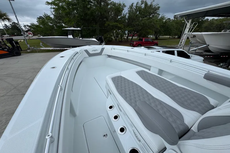 Slide: The Image of 2026 Invincible 33 Open Fisherman boat with sleek seating and modern design. - 19