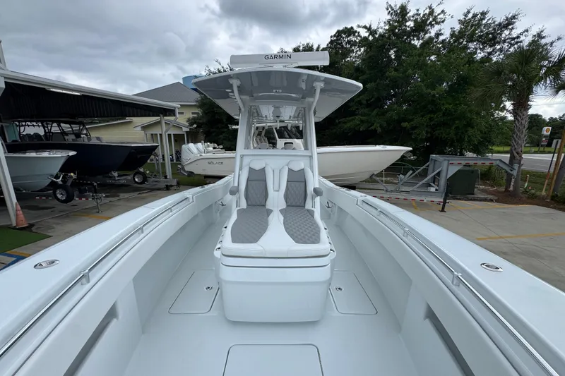 Slide: The Image of 2026 Invincible 33 Open Fisherman boat with sleek design and spacious seating. - 22