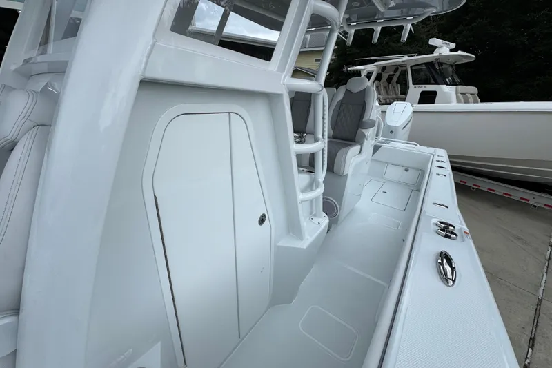 Slide: The Image of 2026 Invincible 33 Open Fisherman boat interior with sleek design and modern features. - 24
