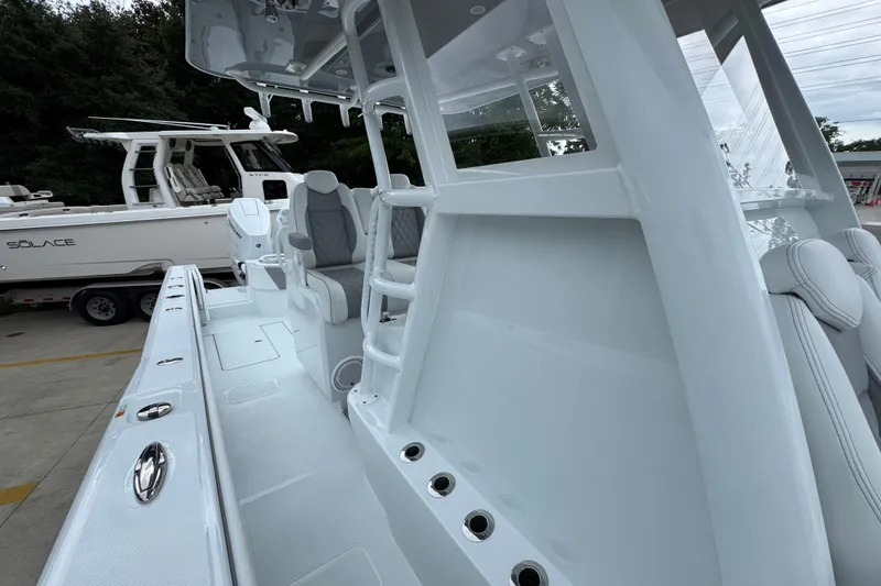 Slide: The Image of 2026 Invincible 33 Open Fisherman boat interior with sleek seating and modern design. - 25