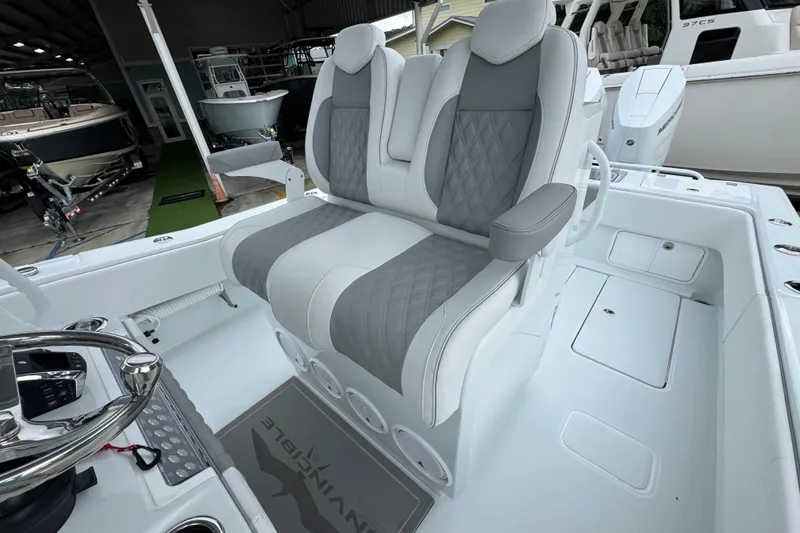 Slide: The Image of 2026 Invincible 33 Open Fisherman boat interior with luxurious seating and modern design. - 28