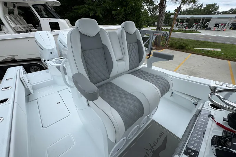 Slide: The Image of 2026 Invincible 33 Open Fisherman boat with luxurious seating and modern design. - 30
