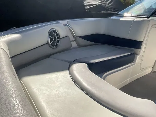 Slide: The Image of Interior of a 2013 Bryant Boats 233X with gray upholstery. - 12