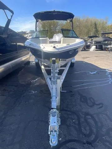 Slide: The Image of 2013 Bryant Boats 233X on trailer, front view. - 2