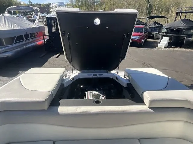 Slide: The Image of Engine compartment of 2013 Bryant Boats 233X with open lid. - 22