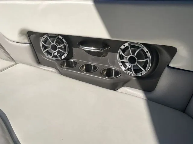 Slide: The Image of Speakers and cup holders on Bryant Boats 233X, 2013 model. - 26