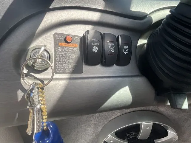 Slide: The Image of Ignition keys and switches in Bryant Boats 233X, 2013 model. - 39
