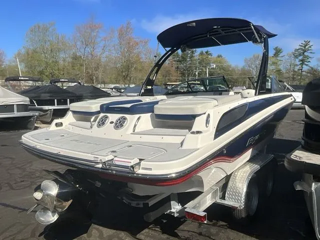 Slide: The Image of 2013 Bryant Boats 233X parked outdoors on a trailer. - 4