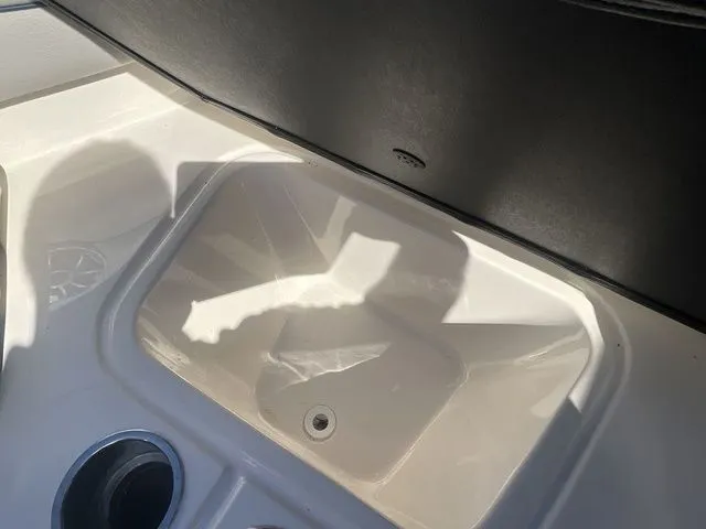 Slide: The Image of Interior of 2013 Bryant Boats 233X featuring built-in sink. - 46