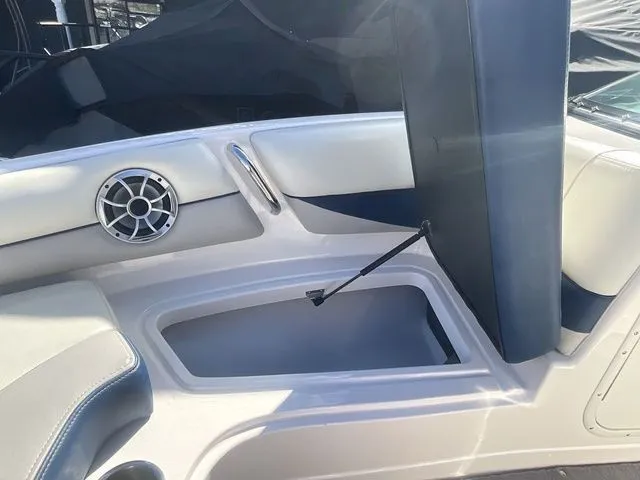 Slide: The Image of Interior of 2013 Bryant Boats 233X with speaker and storage compartment. - 48