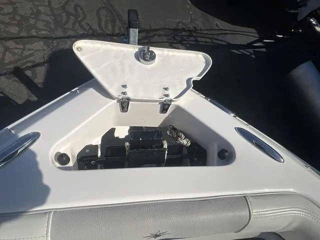 Slide: The Image of Anchor compartment of a 2013 Bryant Boats 233X with open lid. - 49