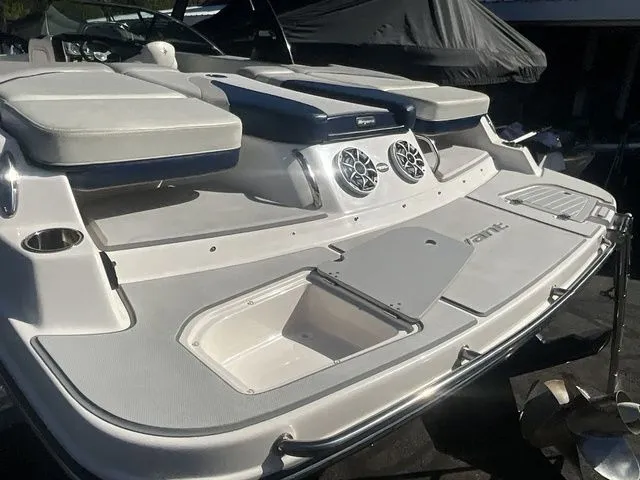 Slide: The Image of 2013 Bryant Boats 233X boat rear with speakers and storage. - 7
