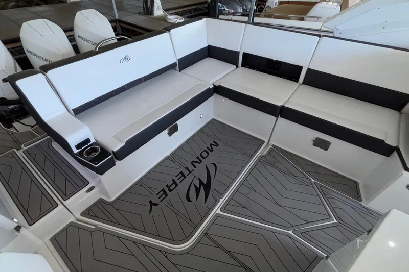Slide: The Image of 2023 Monterey 385SS Super Sport boat interior with sleek seating and modern design. - 12