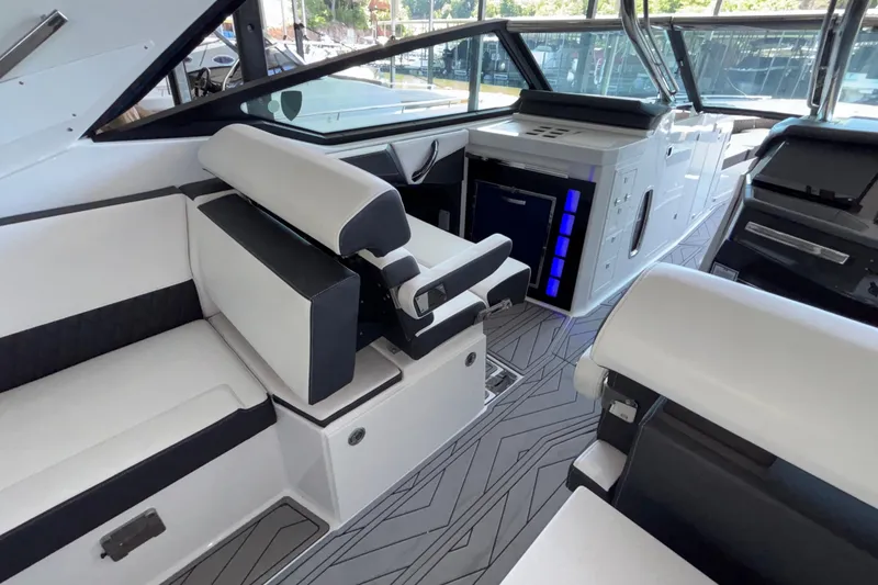 Slide: The Image of Interior of 2023 Monterey 385SS Super Sport boat with modern seating and sleek design. - 20