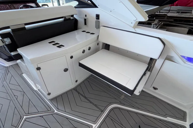 Slide: The Image of 2023 Monterey 385SS Super Sport interior with sleek seating and modern cabinetry. - 25