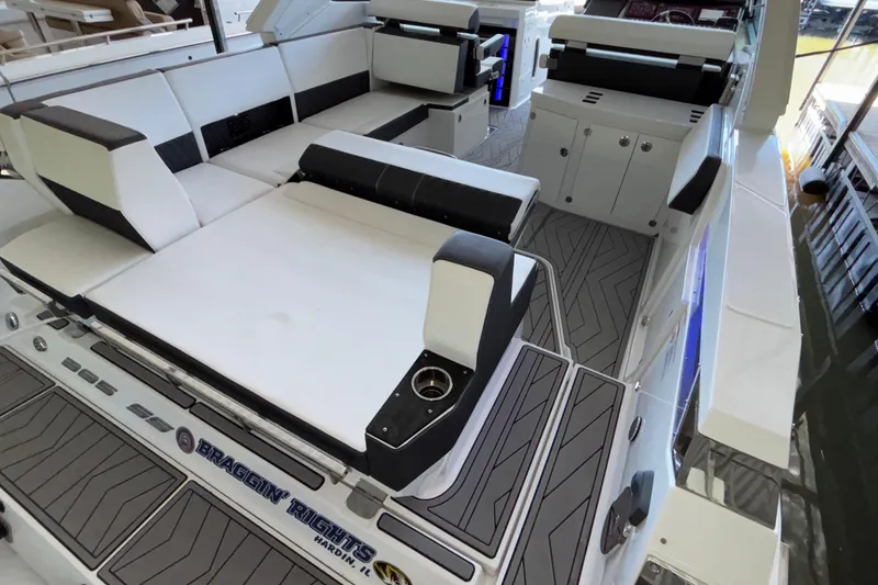 Slide: The Image of 2023 Monterey 385SS Super Sport boat interior with sleek seating and modern design. - 29