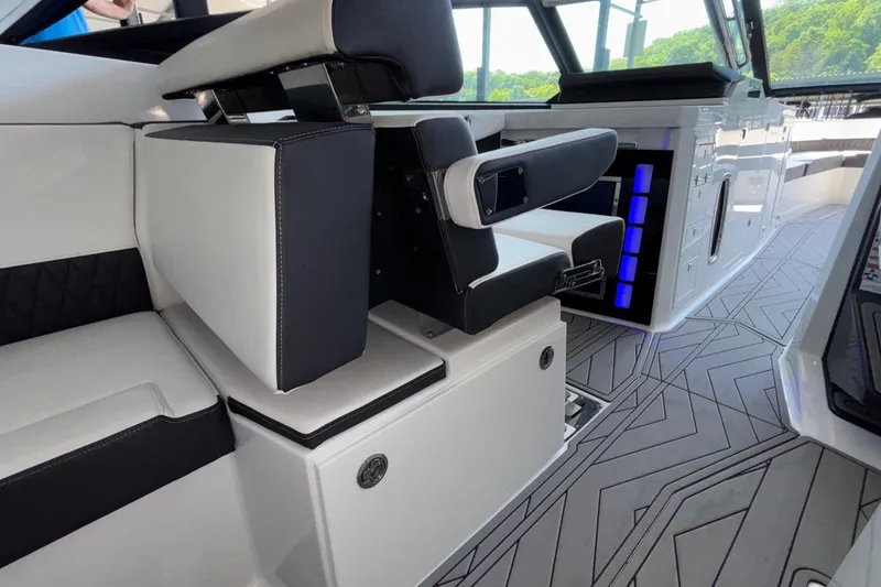 Slide: The Image of Interior of 2023 Monterey 385SS Super Sport boat with modern seating and sleek design. - 32