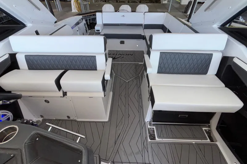 Slide: The Image of Luxurious interior of 2023 Monterey 385SS Super Sport boat with stylish seating and modern design. - 34