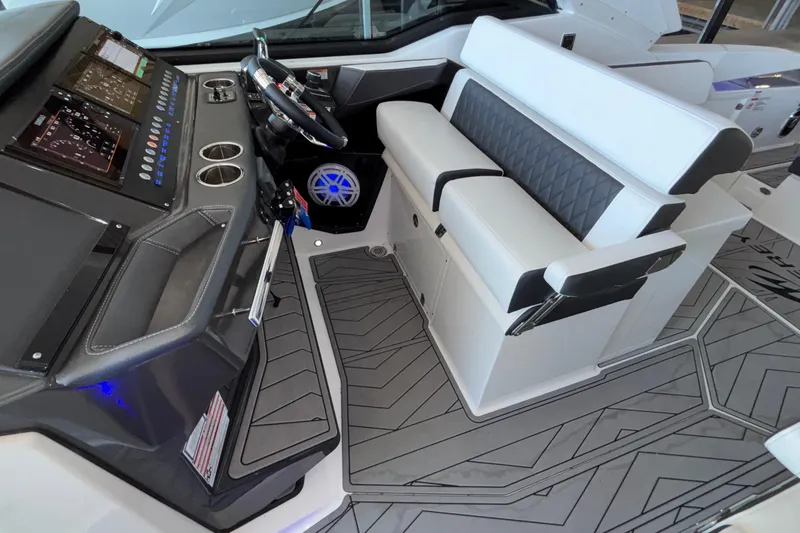 Slide: The Image of 2023 Monterey 385SS Super Sport cockpit with modern dashboard and luxurious seating. - 35