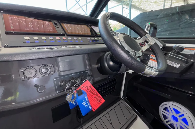 Slide: The Image of 2023 Monterey 385SS Super Sport dashboard with steering wheel and control panel. - 37