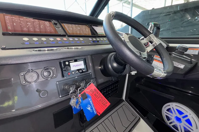 Slide: The Image of Cockpit of 2023 Monterey 385SS Super Sport with steering wheel and control panel. - 38