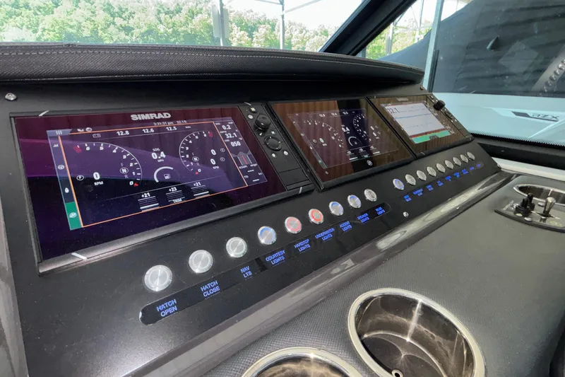 Slide: The Image of Dashboard of 2023 Monterey 385SS Super Sport boat with advanced controls and displays. - 39