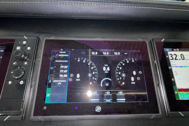Slide: The Image of Dashboard of a 2023 Monterey 385SS Super Sport boat displaying engine metrics and controls. - 41
