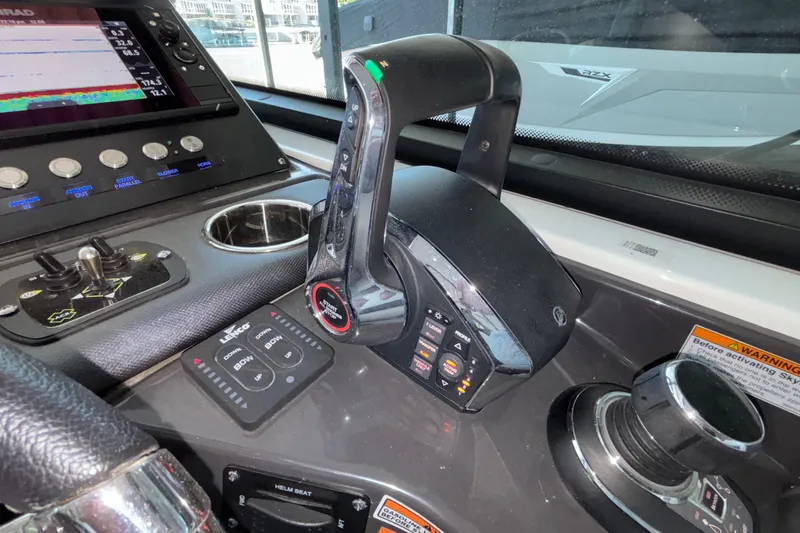 Slide: The Image of Control panel of 2023 Monterey 385SS Super Sport boat with throttle and navigation display. - 42