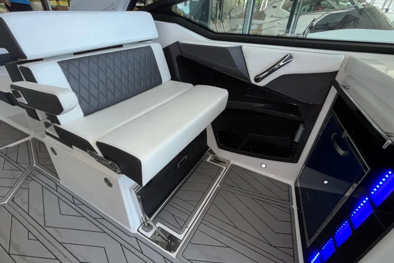 Slide: The Image of Interior of 2023 Monterey 385SS Super Sport boat with modern seating and sleek design. - 49