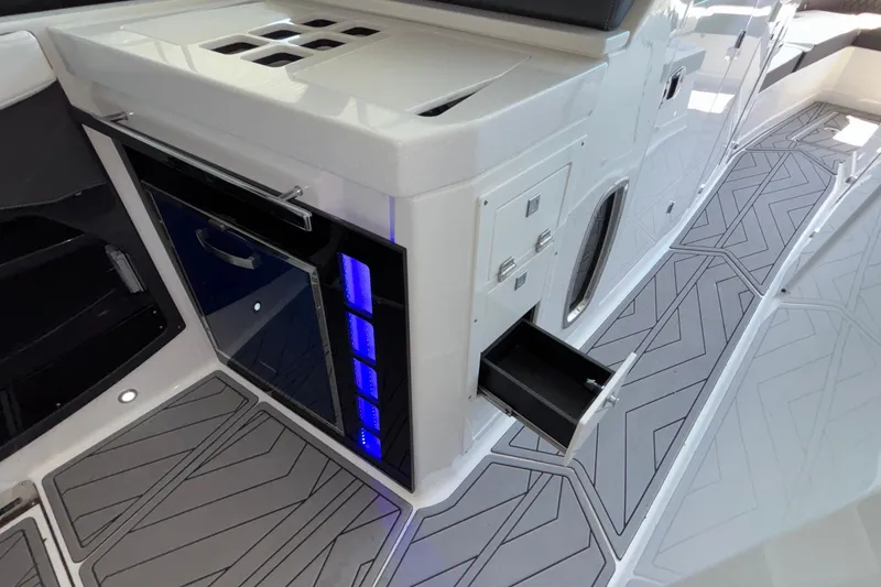Slide: The Image of 2023 Monterey 385SS Super Sport interior with sleek cabinetry and modern flooring design. - 58
