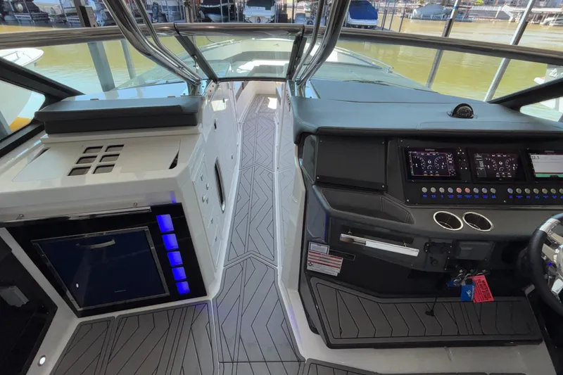 Slide: The Image of 2023 Monterey 385SS Super Sport cockpit with modern controls and sleek design. - 60