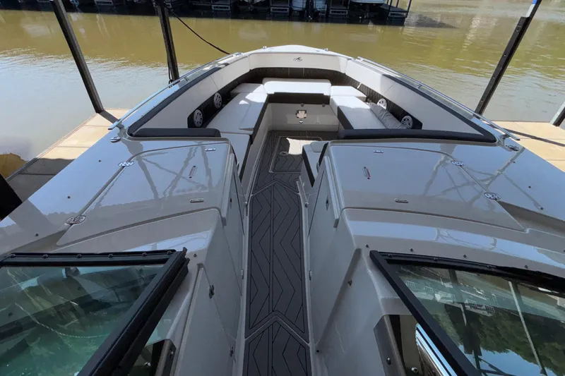 Slide: The Image of 2023 Monterey 385SS Super Sport boat interior with sleek seating and modern design. - 61