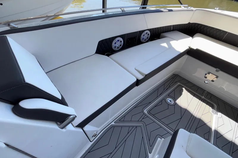 Slide: The Image of 2023 Monterey 385SS Super Sport boat interior with sleek seating and modern design. - 62