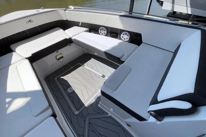 Slide: The Image of 2023 Monterey 385SS Super Sport boat interior with luxurious seating and modern design. - 65