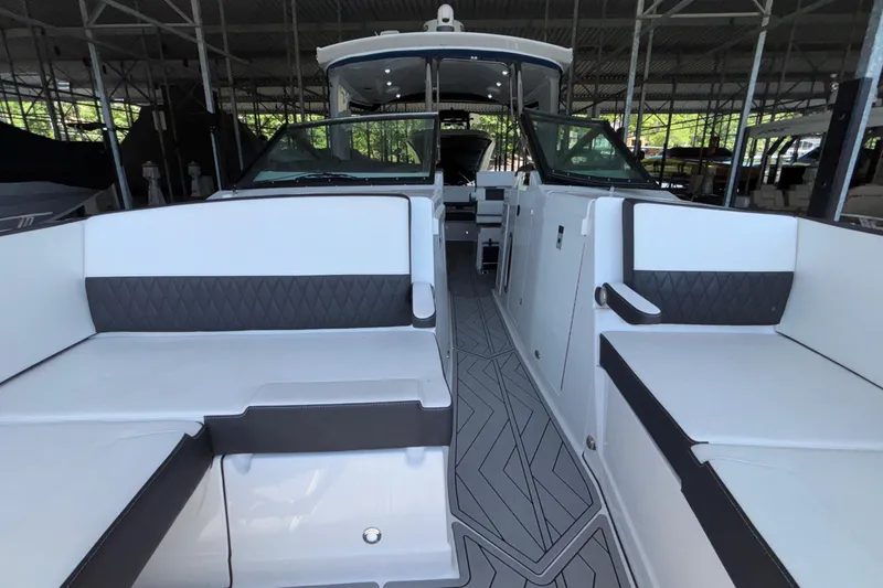 Slide: The Image of 2023 Monterey 385SS Super Sport boat interior with sleek seating and modern design. - 66