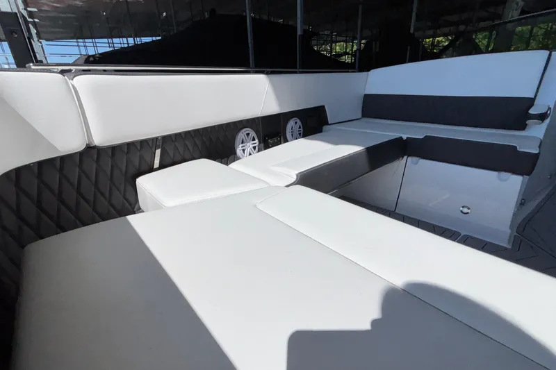 Slide: The Image of Luxurious seating area on 2023 Monterey 385SS Super Sport boat, featuring sleek design and comfort. - 67