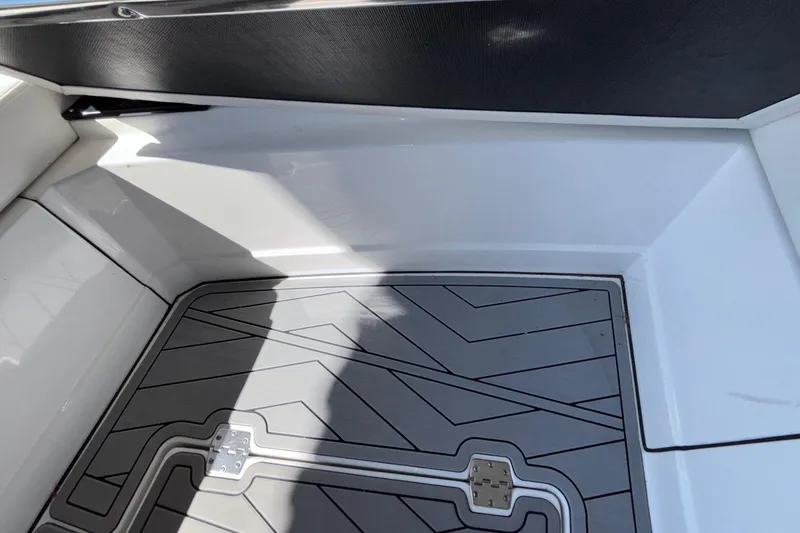 Slide: The Image of 2023 Monterey 385SS Super Sport boat interior with sleek, modern flooring design. - 70