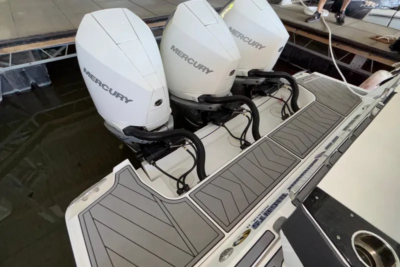 Slide: The Image of 2023 Monterey 385SS Super Sport with triple Mercury outboard engines at dock. - 8