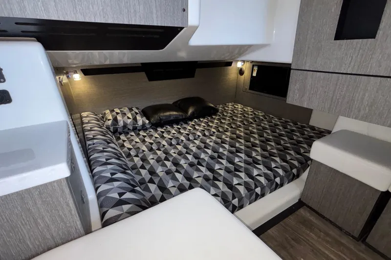Slide: The Image of 2023 Monterey 385SS Super Sport cabin interior with geometric bedding and modern design. - 80