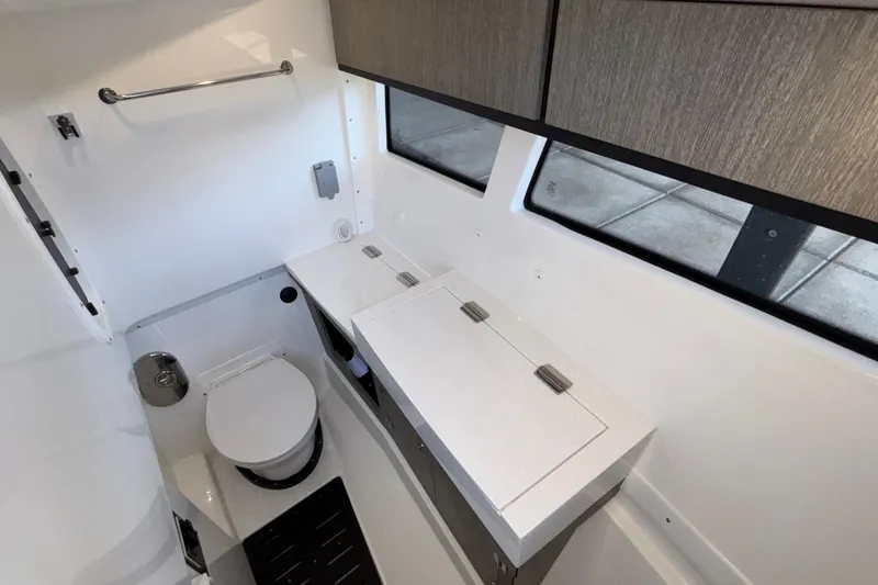 Slide: The Image of Modern bathroom interior of 2023 Monterey 385SS Super Sport boat, featuring sleek design and fixtures. - 87