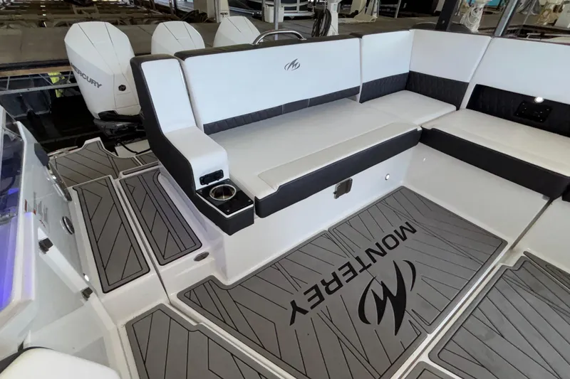 Slide: The Image of 2023 Monterey 385SS Super Sport boat interior with sleek seating and modern design. - 9