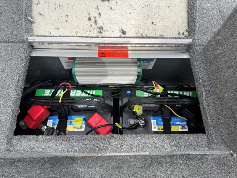 Slide: The Image of Battery compartment of 2010 Alumacraft Navigator 175 CS boat. - 18