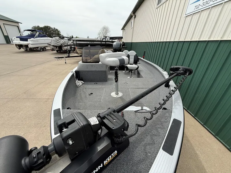 Slide: The Image of 2010 Alumacraft Navigator 175 CS boat parked outdoors. - 3