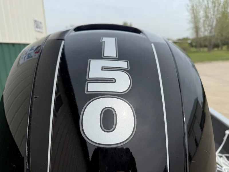 Slide: The Image of Close-up of 150 HP outboard motor, Alumacraft Navigator 175 CS, 2010. - 7