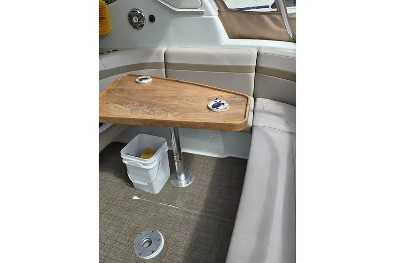 Slide: The Image of Interior of 2008 Formula 40 Performance Cruiser with wooden table and seating area. - 10