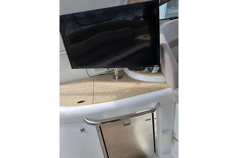 Slide: The Image of 2008 Formula 40 Performance Cruiser interior with TV and mini fridge. - 11