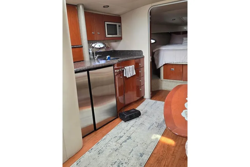 Slide: The Image of Interior of 2008 Formula 40 Performance Cruiser with kitchenette and cozy bedroom. - 12