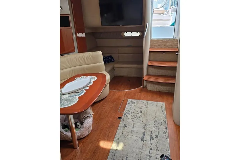 Slide: The Image of Interior of 2008 Formula 40 Performance Cruiser with cozy seating and elegant wooden finishes. - 13