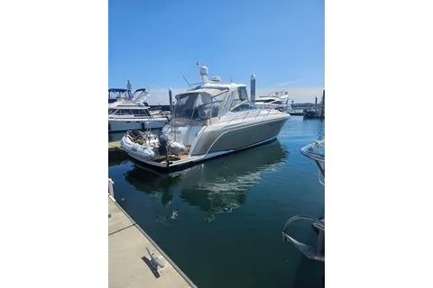 Slide: The Image of 2008 Formula 40 Performance Cruiser docked in a sunny marina. - 3